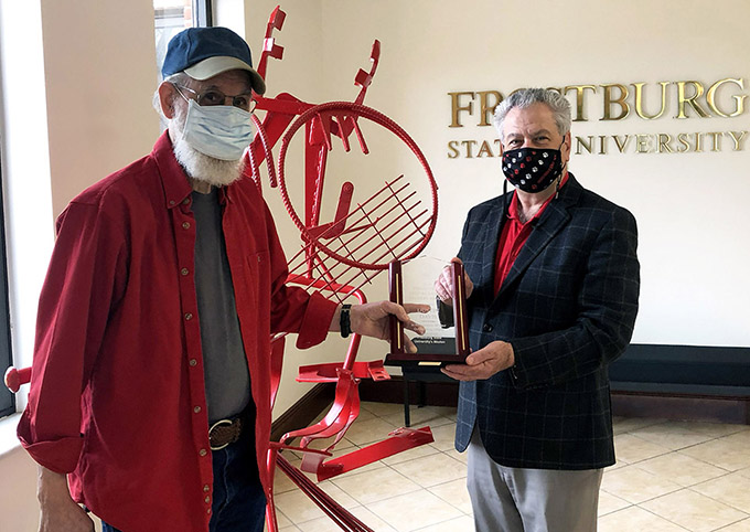 Davis and nowaczyk hold award