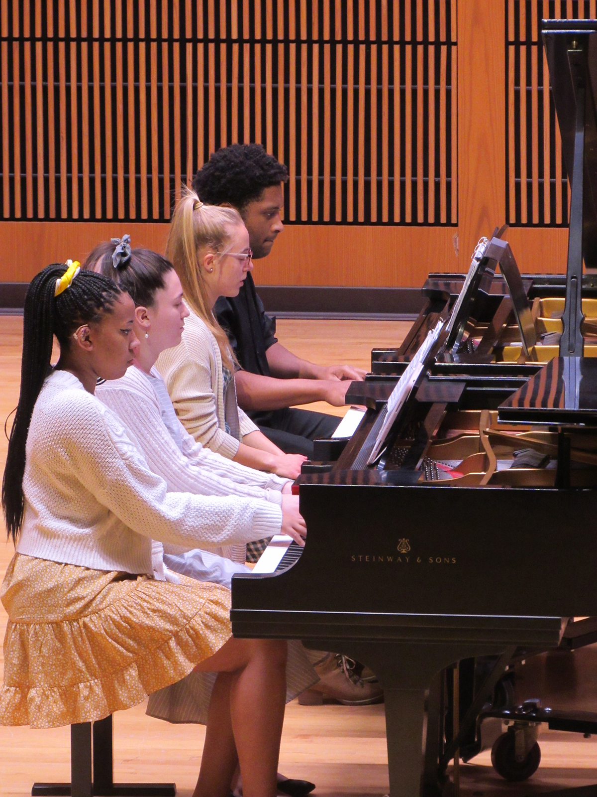 students playing piano
