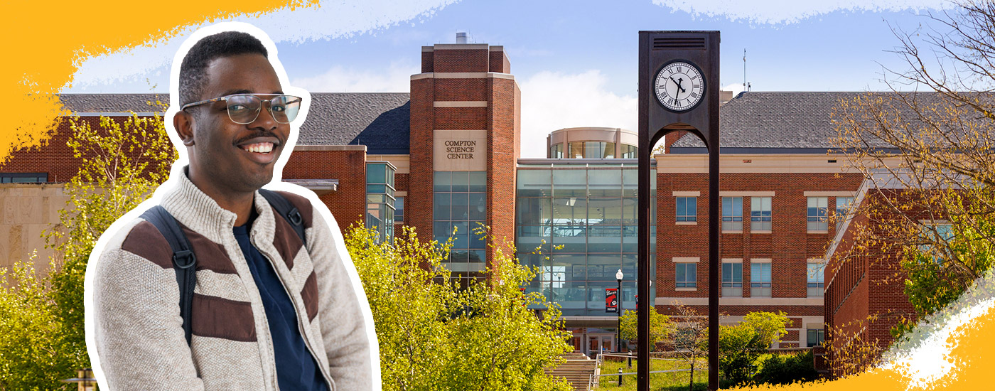 Student outside at the clock tower