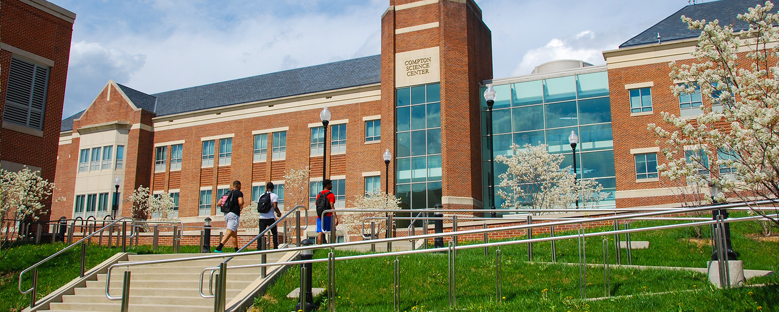 Student talking as they walk to classes