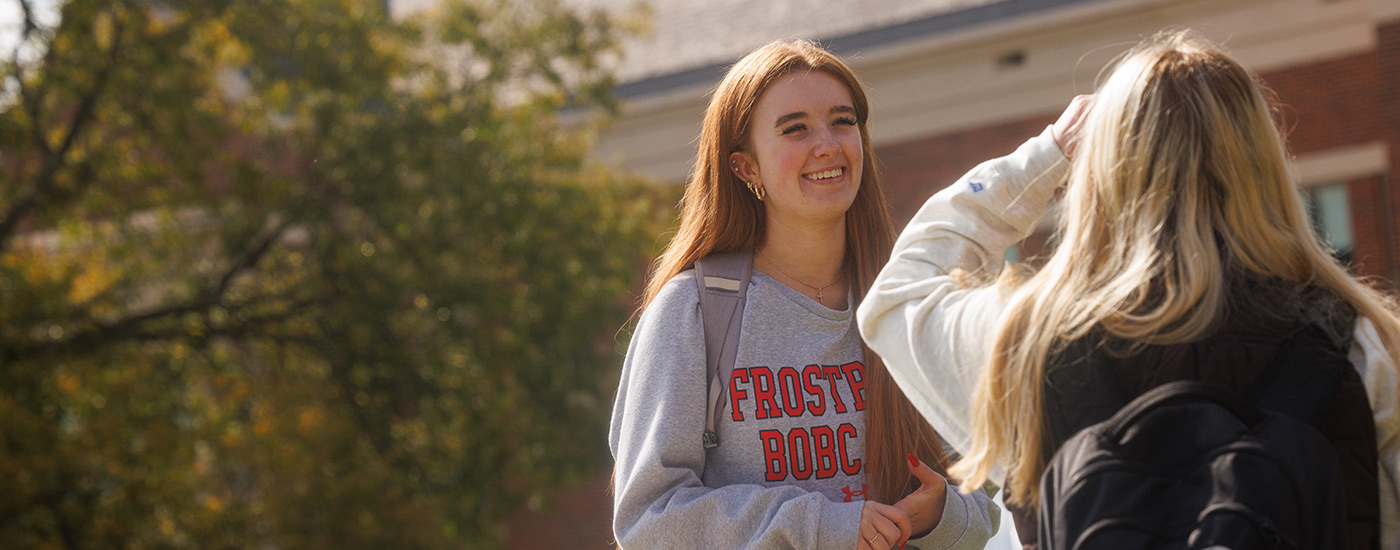 Two female study talking