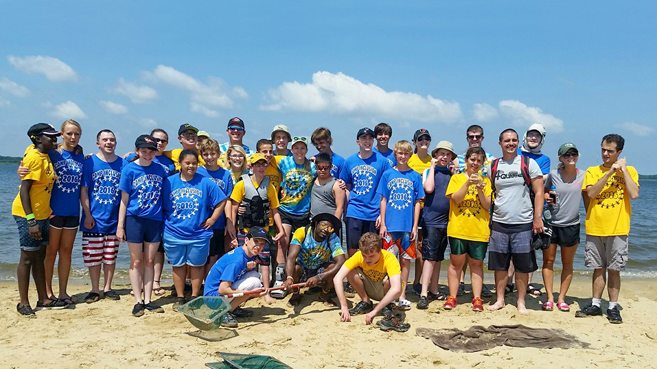 camp inclusion group photo on beach