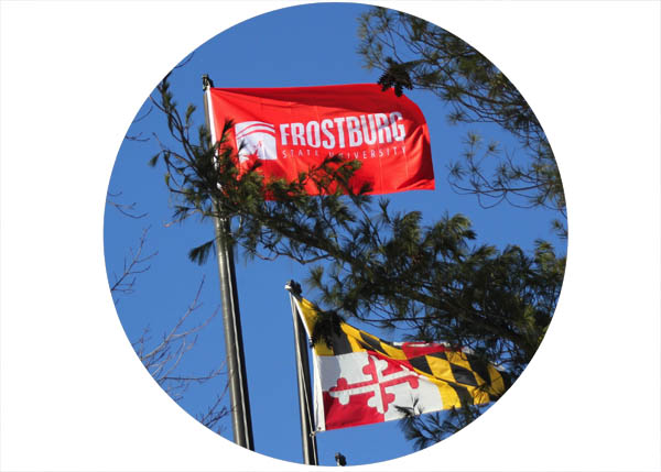 FSU and MD flags flying against blue skies