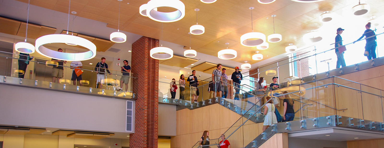 Students conversing as they move between classes